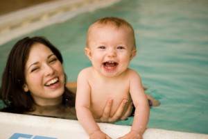 happy-kid-small Swimming kids learn to take instructions from an early age