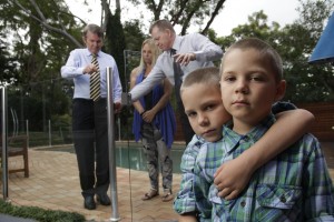 Pool Register Launch RLSNSW CEO David Macalister, Minister Don Page, twin boys Seth and Braith Hedley (who survived a near drowning in a backyard pool) and their mother Belinda Hedley